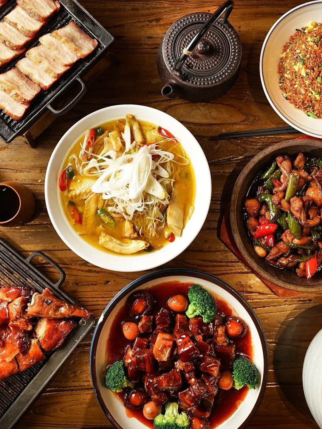 Hangzhou lakeside Chinese-style restaurant interior, elegant dining environment with garden view