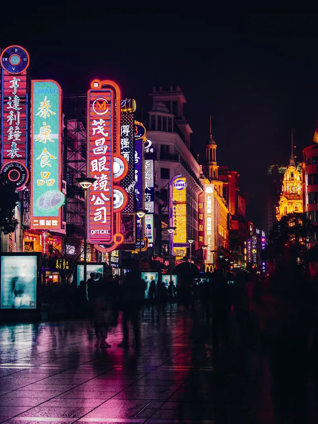Nanjing Road Pedestrian Street bustling shopping scene with neon signs and crowds