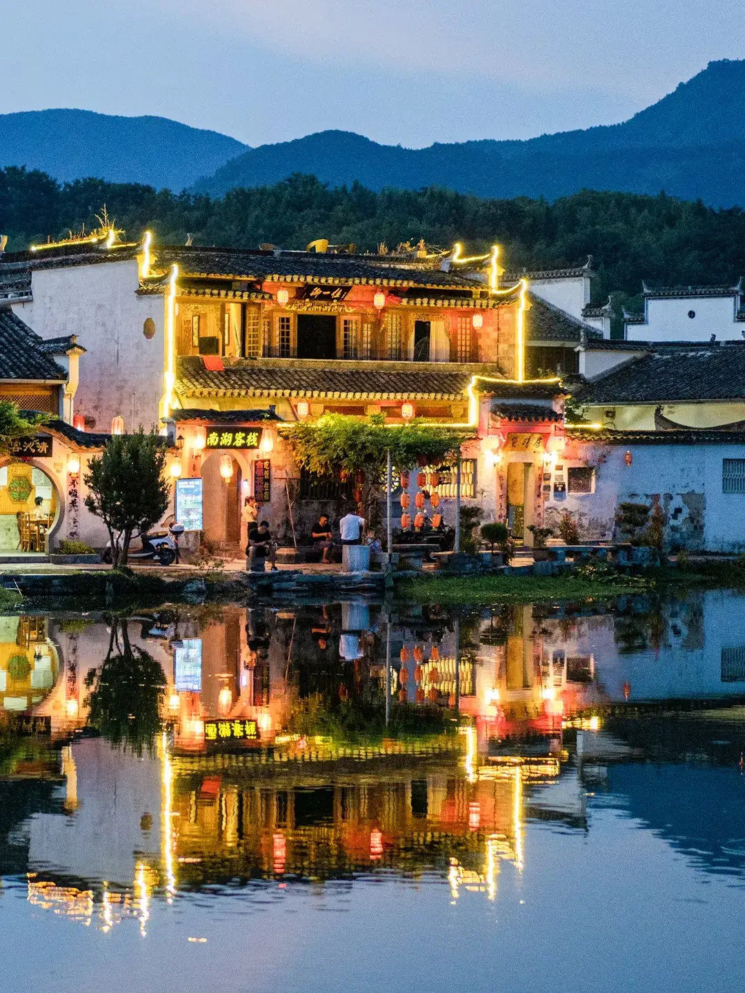Hongc Village ancient architecture under moonlight